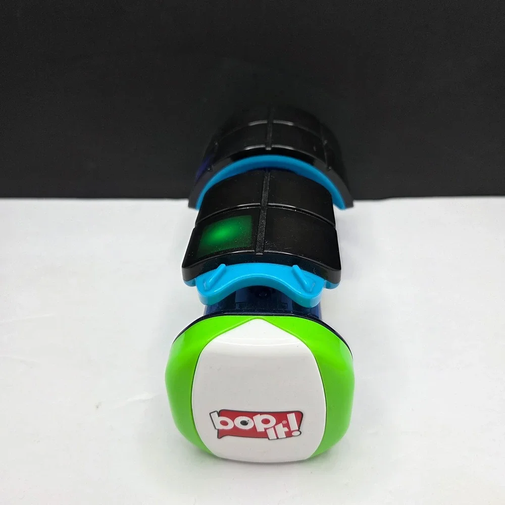 Hasbro Bop It Tetris Electronic Handheld Game Blue Black Green Lights Sounds Toy